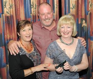 (L-R) Accepting the award on behalf of the team Liz Newell, John Robson, Marie Meachen.